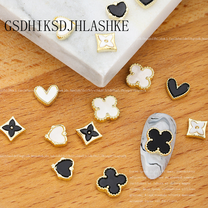 Black and white four-leaf clover love imitation shell flower nail drill accessories 20PCS